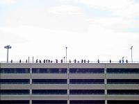  Bunch of skaters on a top of a parking building