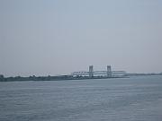  Marine Parkway Gil Hodges Memorial Bridge in distance.
The Marine Parkway Gil Hodges Memorial Bridge was opened by the Marine Parkway Authority in 1937 to provide access to the Rockaway Peninsula, which previously could be reached only by ferry or by a circuitous route around the eastern end of Jamaica Bay. When it was built, the bridge's vertical lift span was the longest in the world. The tapering, curled tops of its towers added a whimsical aspect to the bridge's design. 